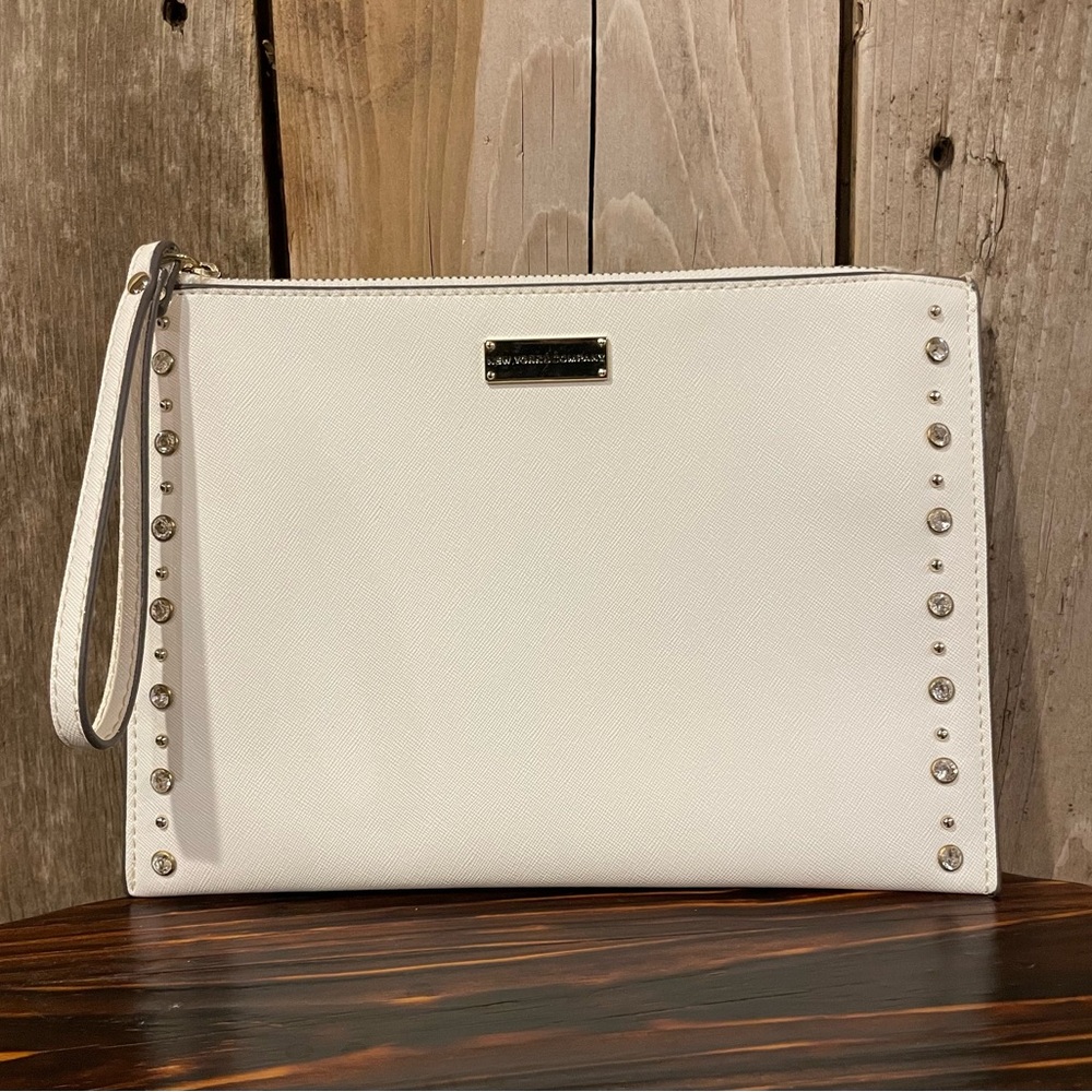 White Clutch with Studded Edges. New without tags.